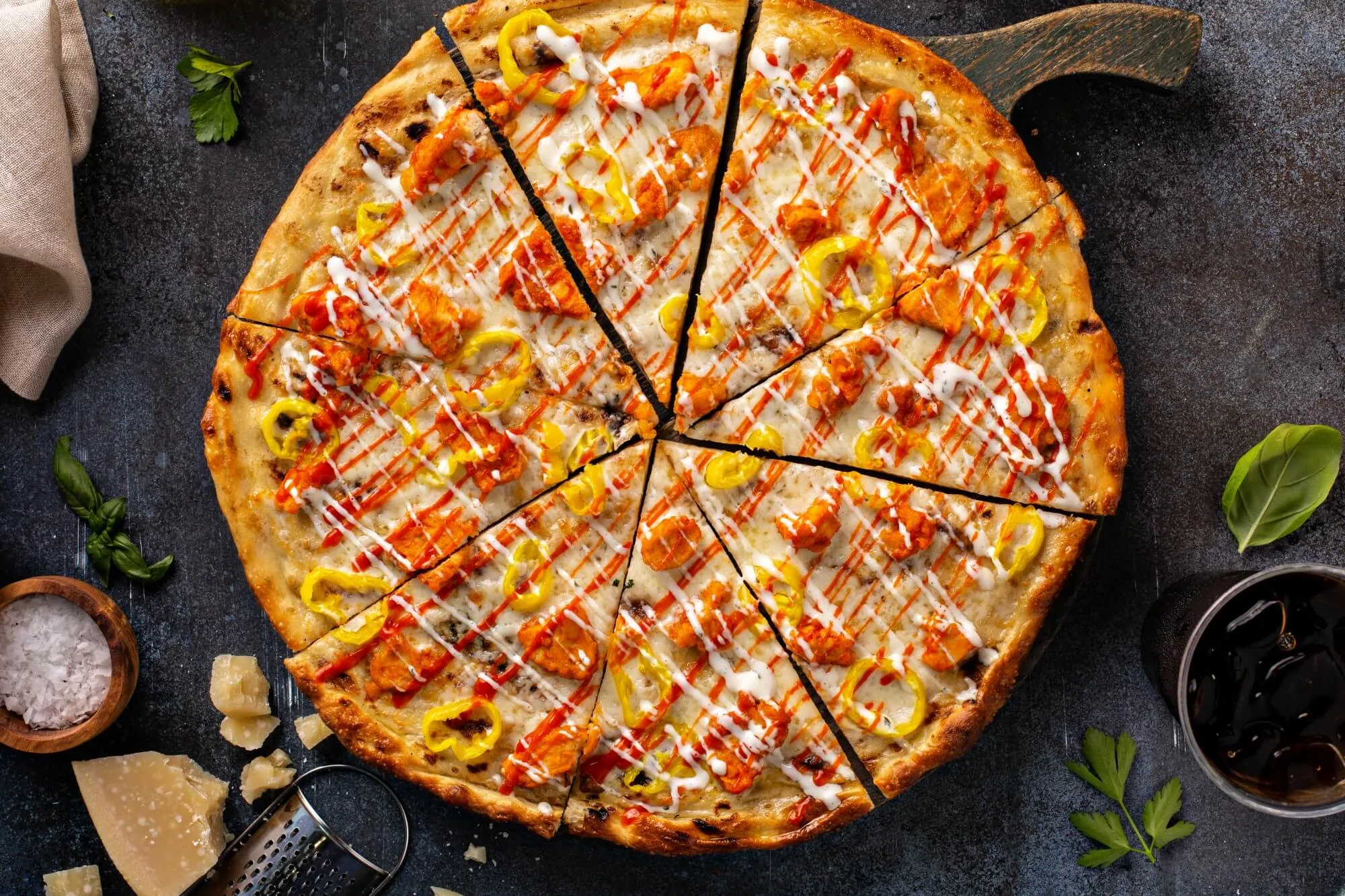 A sliced pizza with herbs